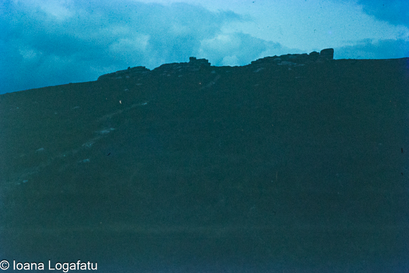 Landscape at dusk showcasing hillside ruins