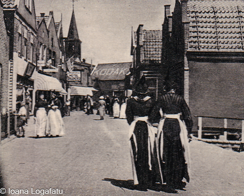 Historic street view with women walking in town
