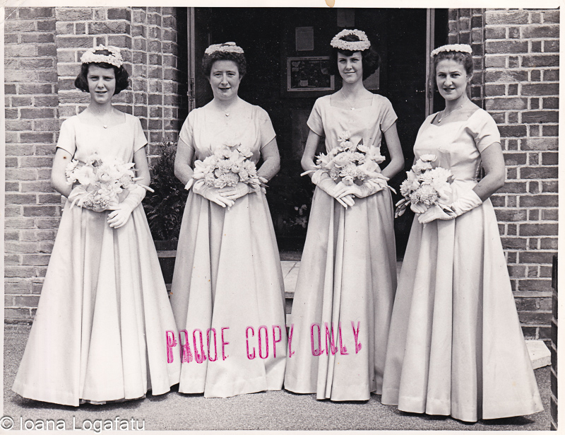 Elegant bridesmaids in vintage attire at a wedding