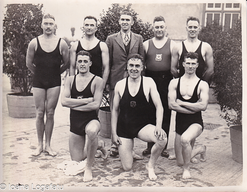 Historic swim team poses proudly in vintage attire