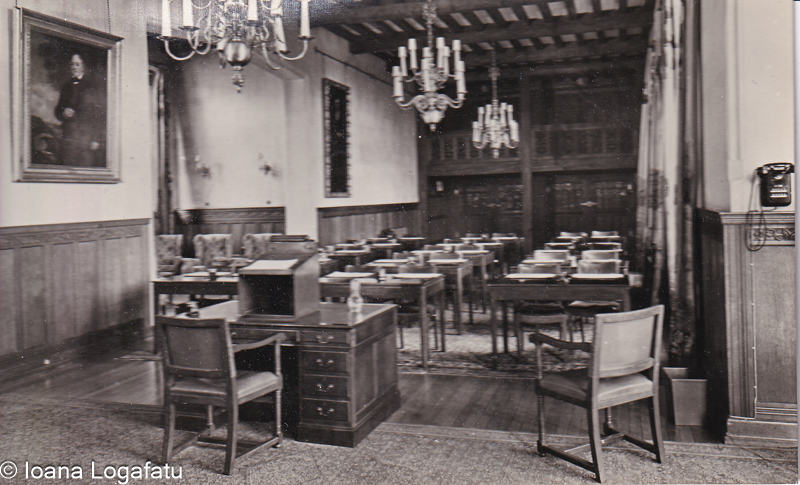 Historic classroom setting with wooden furniture