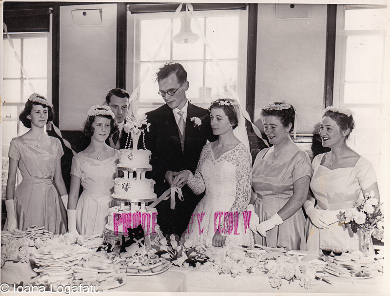 Joyful celebration of love with a wedding cake