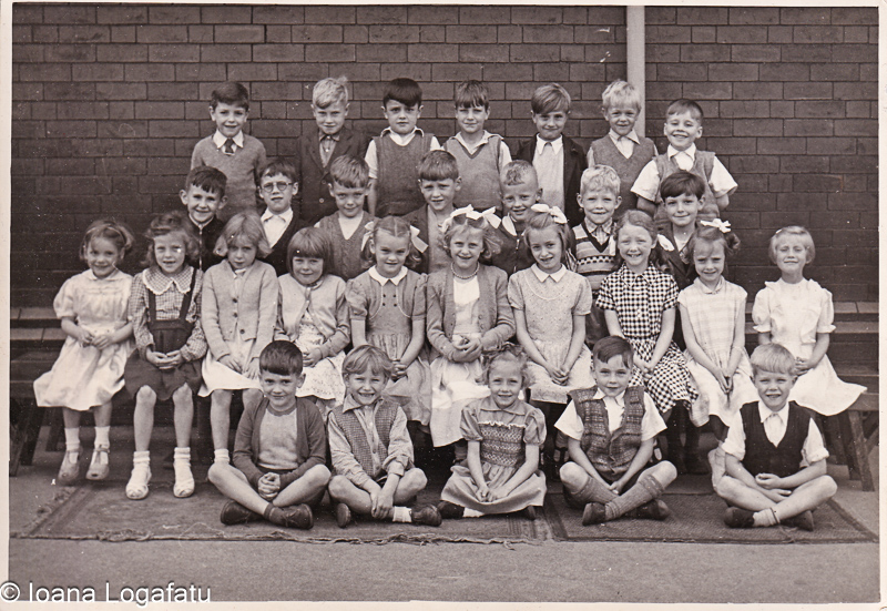 Children gather for a group photograph at school