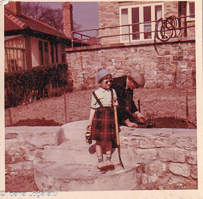 Little gardener in the yard sharing joyful moments