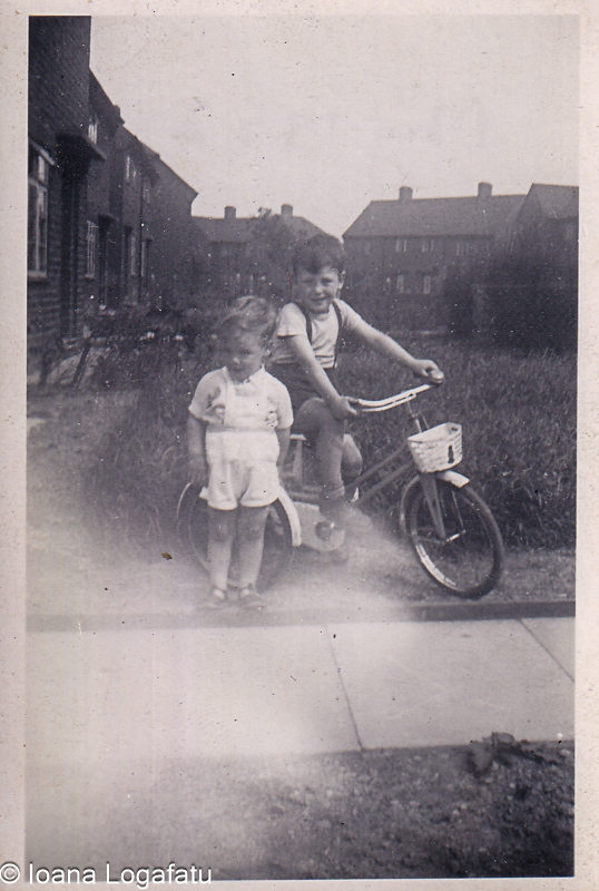 Two children enjoying a sunny day on bikes