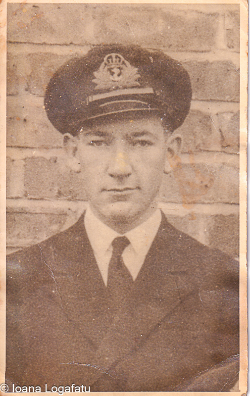 Young naval officer in uniform stands tall