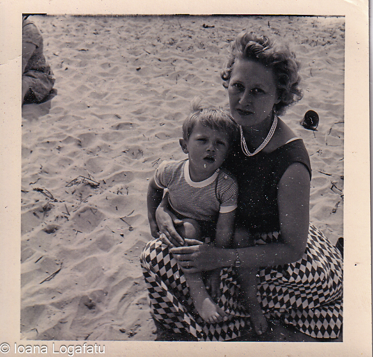 Mother and child enjoying a sunny beach day