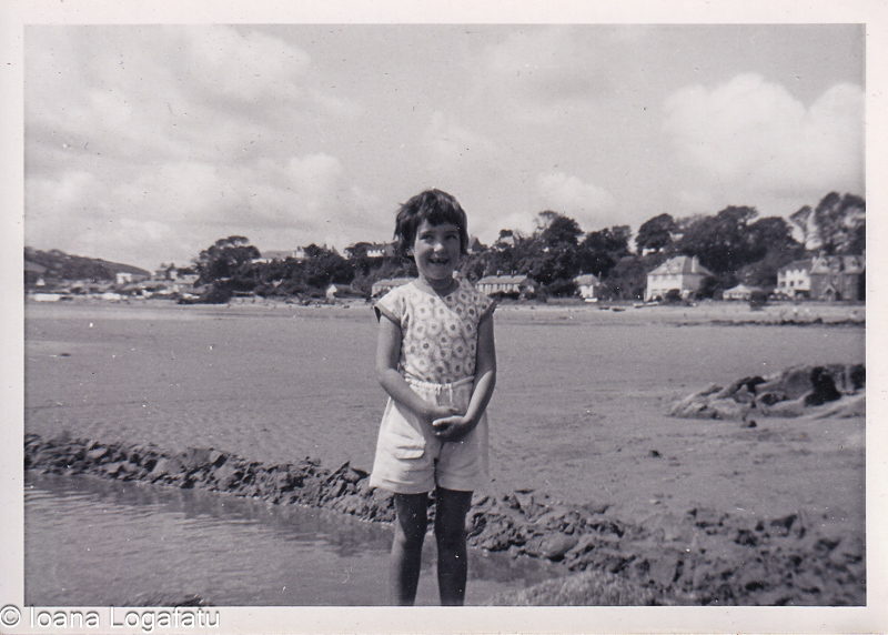 Young girl enjoying a sunny day at the beach