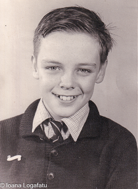 Smiling boy in vintage school clothes
