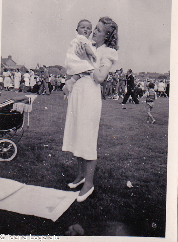 Mother and child enjoy a sunny day at the fair