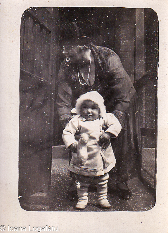 Joyful moments of a child and caregiver in winter