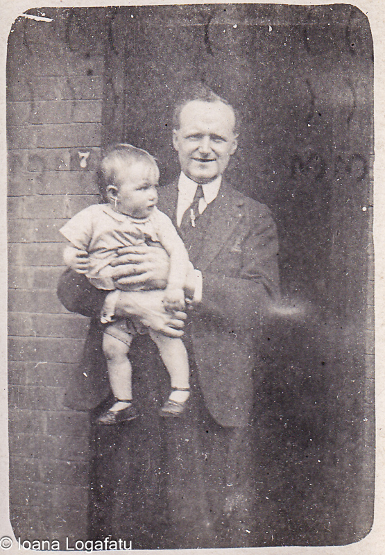 Happy moment between father and baby in the sun