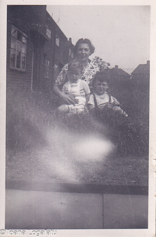 Joyful family moments in a grassy yard