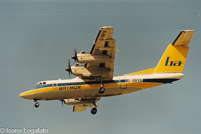 Vintage aircraft soaring through a clear sky above