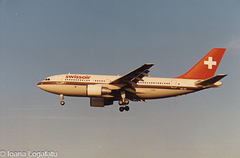 Swissair aircraft preparing for landing at sunset