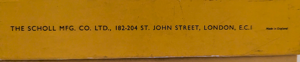 Sign displaying company information in London