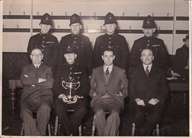 Officers proudly with trophy