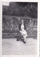 Woman enjoys a sunny day in the garden outdoors