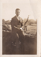 Classic charm of a young man in a serene field