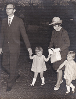 Family stroll on a sunny day in the park