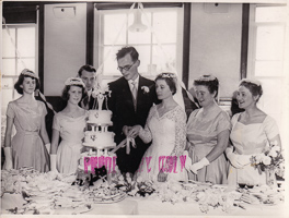 Joyful celebration of love with a wedding cake