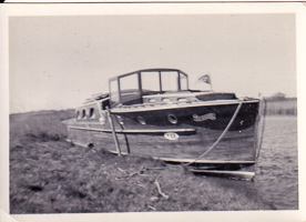 Old boat on shore in tranquil setting