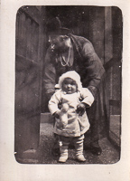 Joyful moments of a child and caregiver in winter