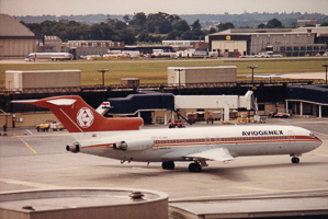 Historic planes at busy airport terminal