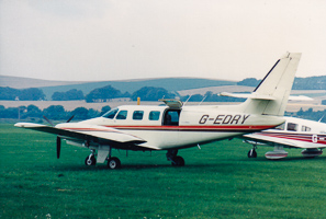 Classic plane on lush green grass