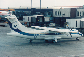 Vintage planes at a busy airport