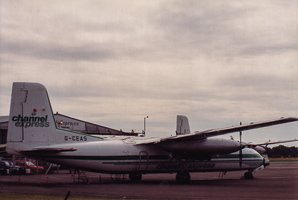 Vintage aircraft parked at the airport terminal
