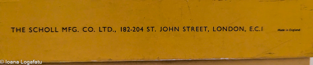 Sign displaying company information in London