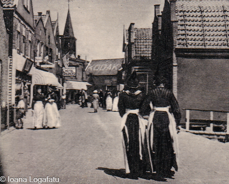 Historic street view with women walking in town
