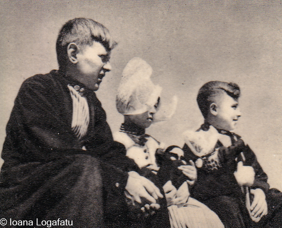 Children seated outdoors enjoying a sunny day