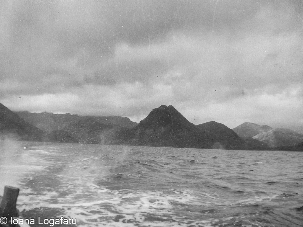 Scenic view of mountains over calm water
