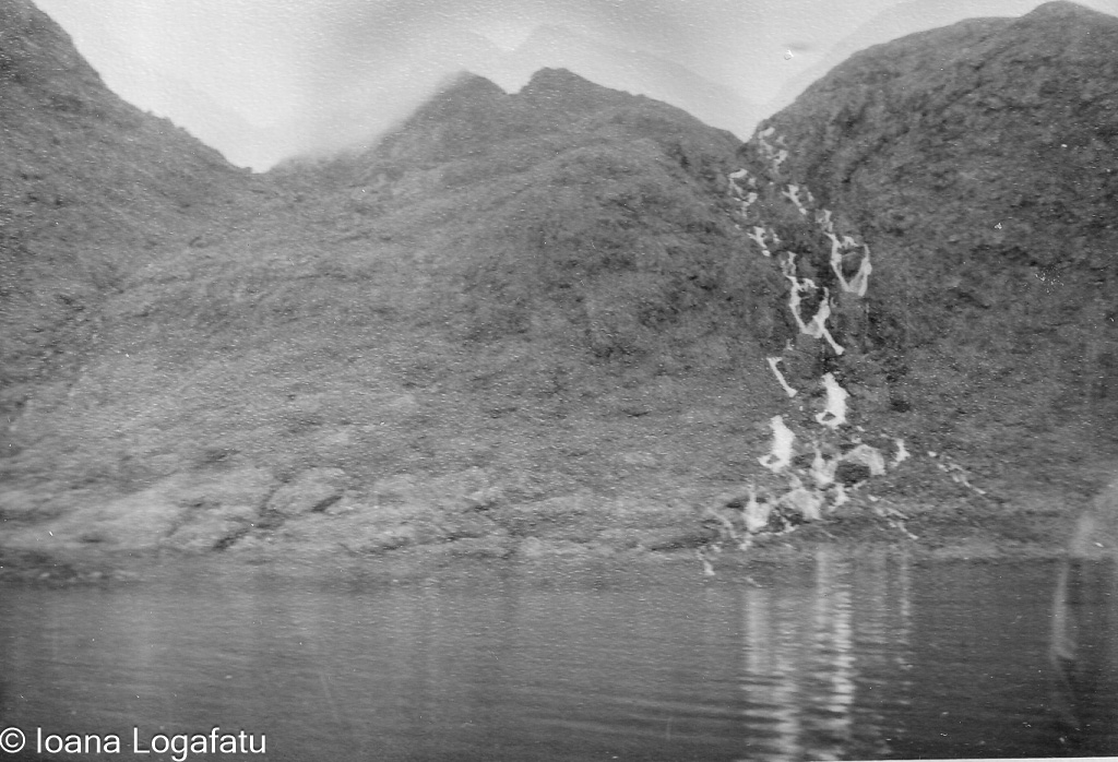 Cascading waterfalls by the lake