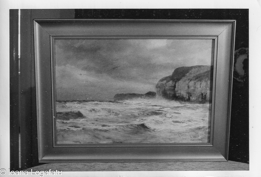 Ocean waves crashing against rugged cliffs