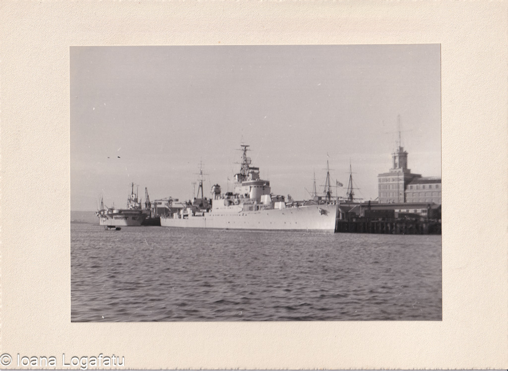 1950s naval ships docked at port
