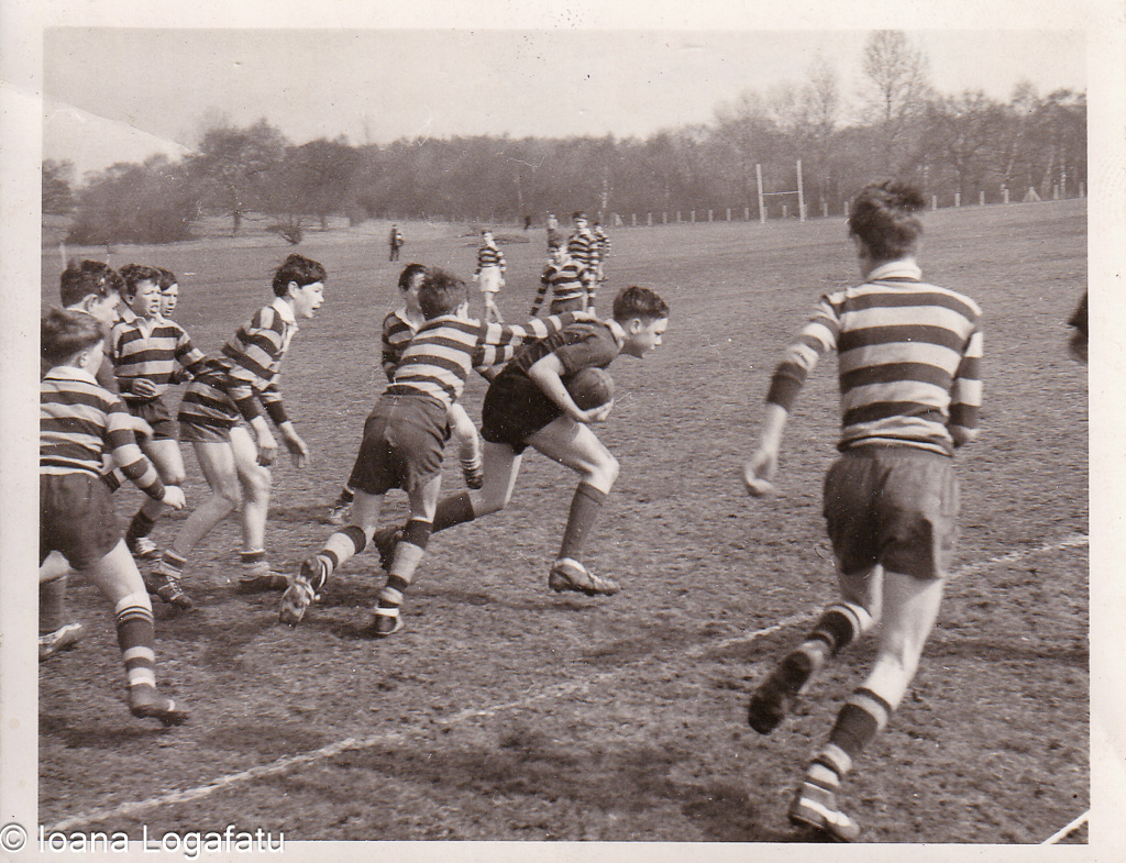 Young athletes compete in rugby outdoors