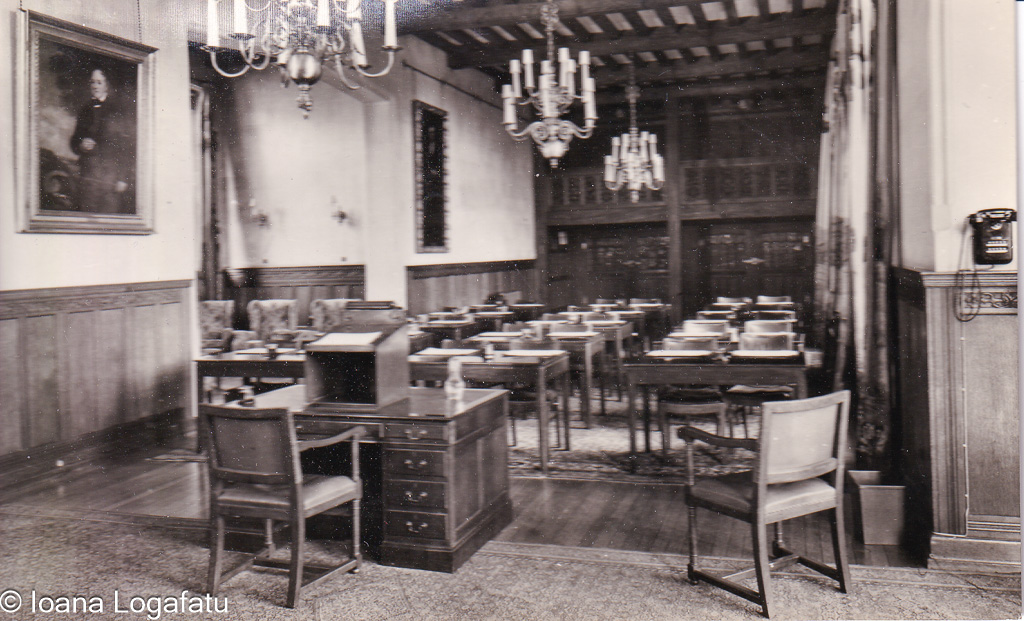 Historic classroom setting with wooden furniture
