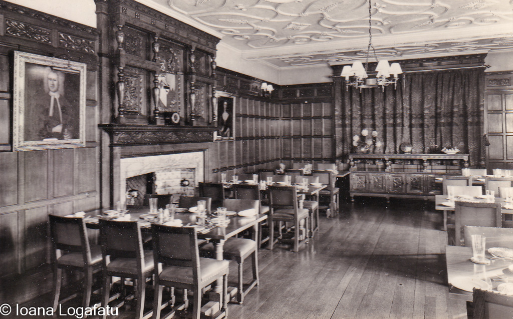 Elegant dining hall with rich woodwork and decor