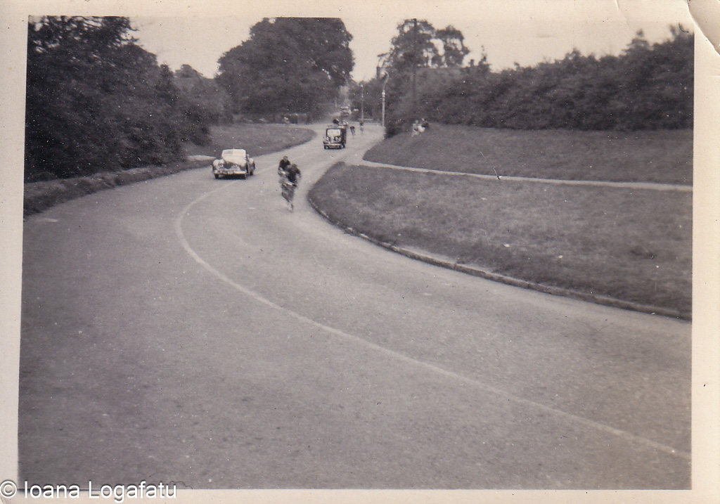 Cyclist rides a winding vintage road