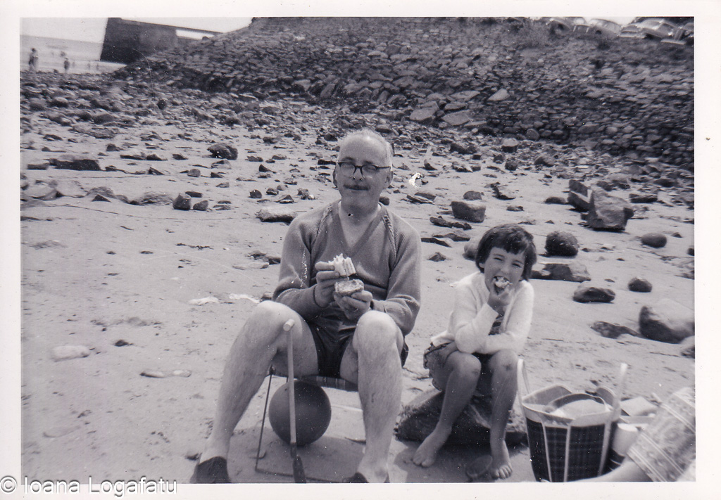 Children enjoying a sunny beach day with snacks