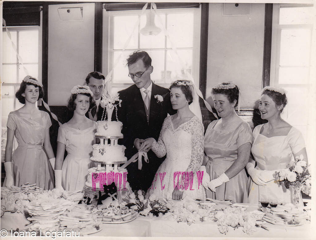 Joyful celebration of love with a wedding cake