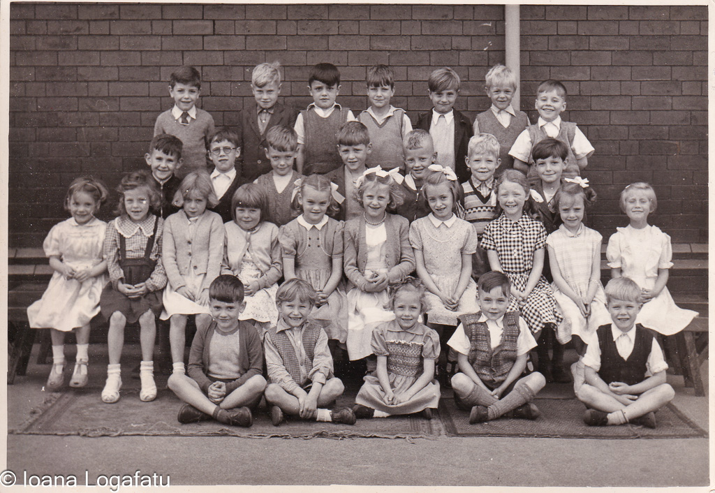 Children gather for a group photograph at school