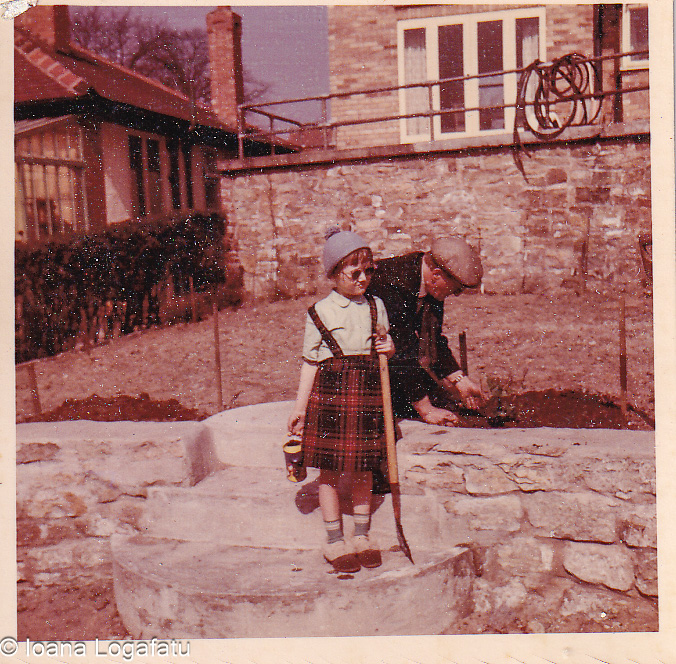 Little gardener in the yard sharing joyful moments