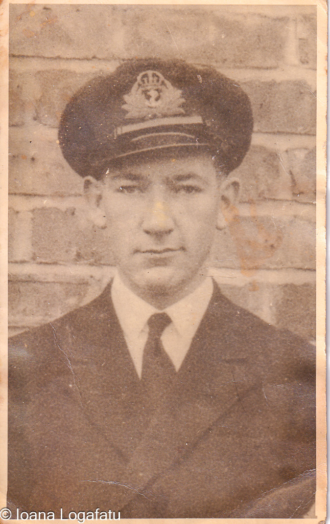 Young naval officer in uniform stands tall