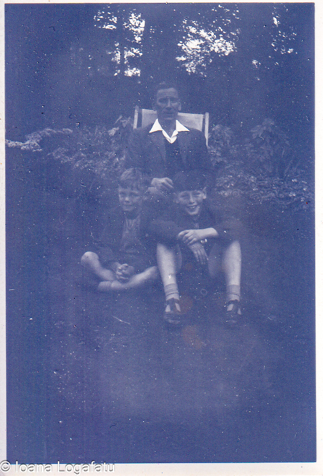 Family gathering in an old garden setting