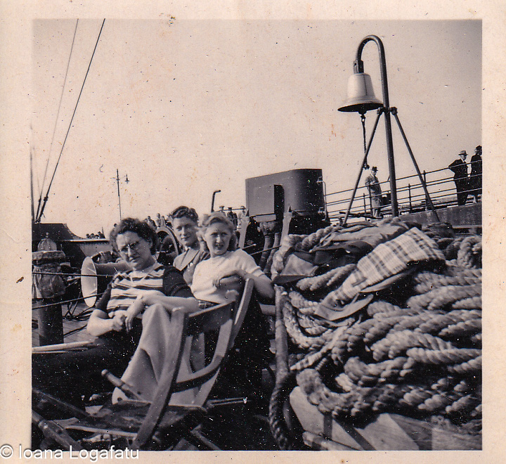Friends enjoying a sunny day aboard a ship