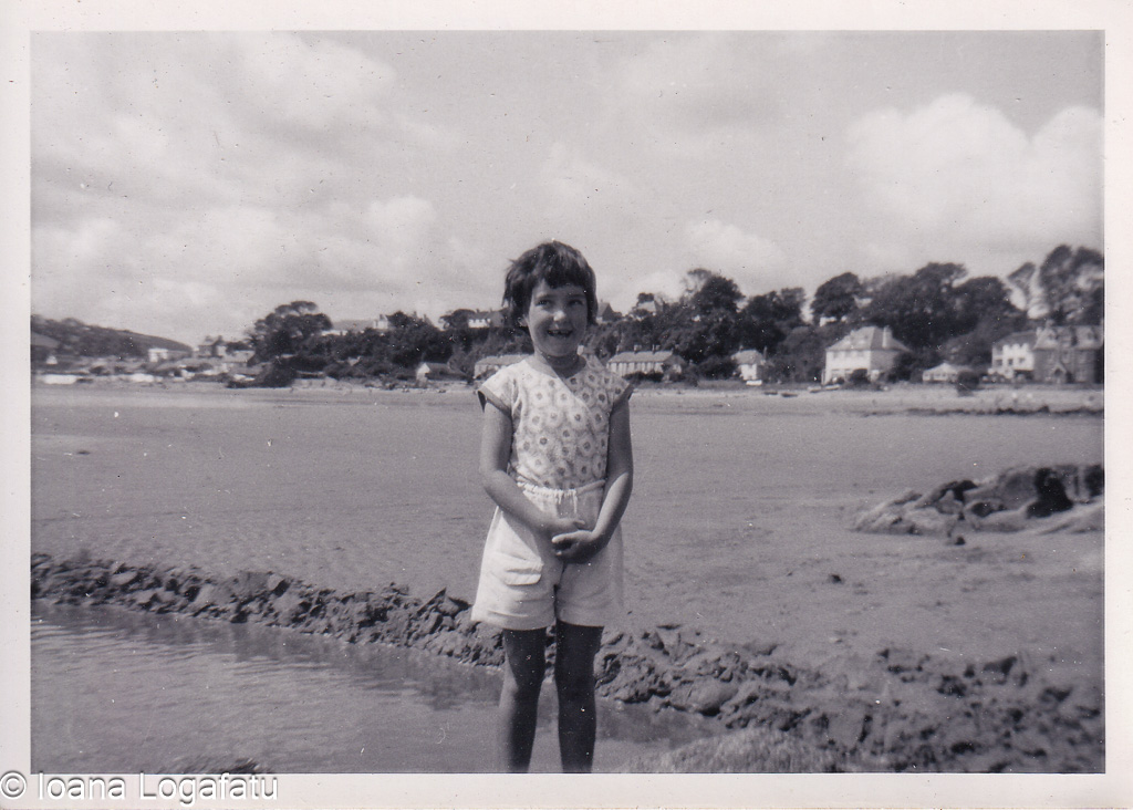 Young girl enjoying a sunny day at the beach